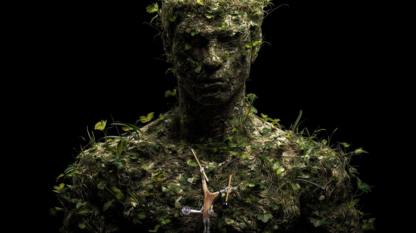 Wearable art jewelry from the Hunter Collection shown on a humanoid totem, expressing accepted weight.