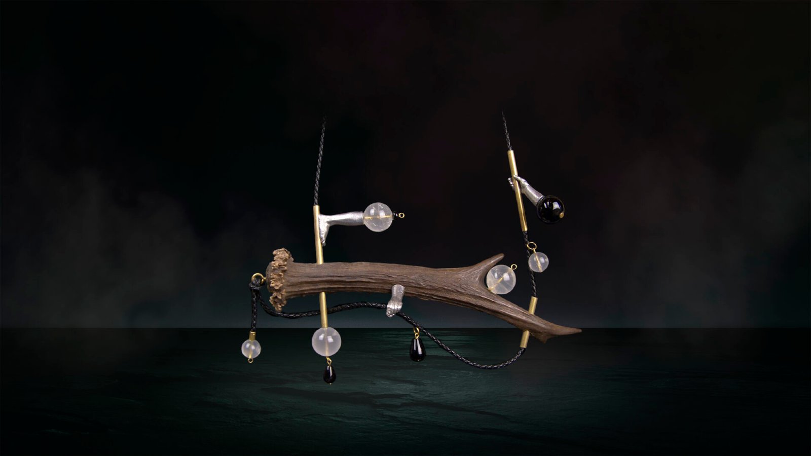 Unique sculptural jewelry crafted from natural antler in Florence, Italy.