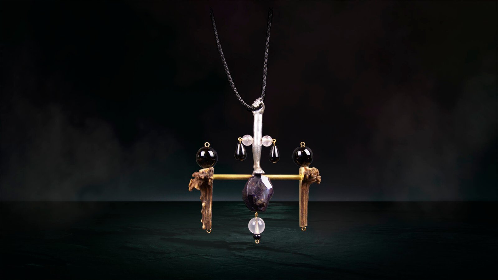 Unique handcrafted antler jewelry object from the Hunter Collection, photographed as a sculptural form.