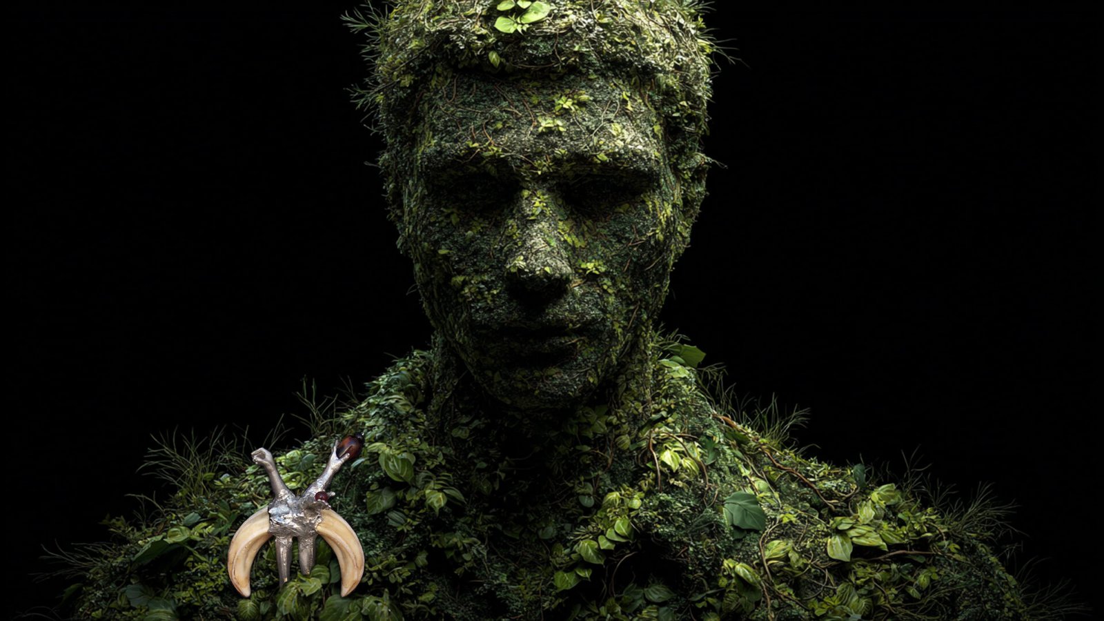 Wearable art jewelry from the Hunter Collection shown on a humanoid totem, exploring pre-linguistic identity.