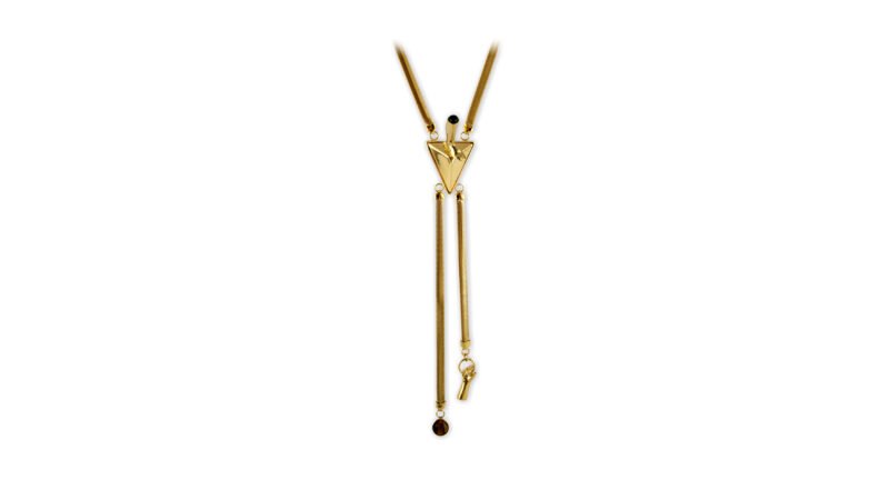 MILIUS Act I Piece 5 Suspended Axis necklace in gold finish featuring a triangular sculptural core, vertically suspended chains, and semi-precious stone detail, combining ritual symbolism with contemporary jewelry architecture.