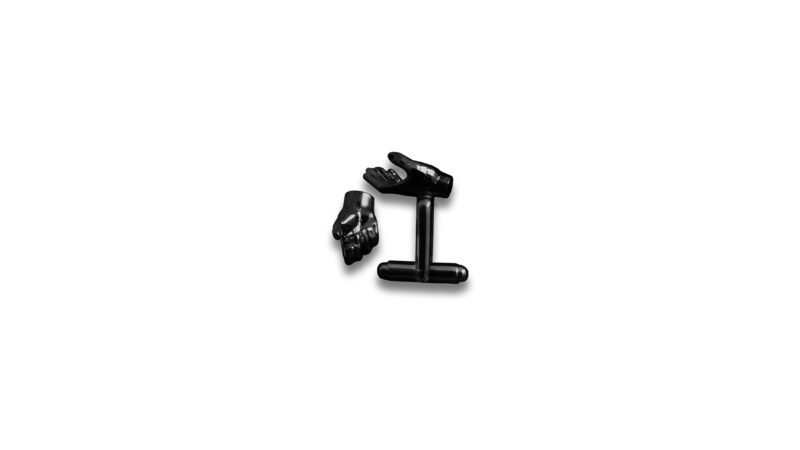 Black varnish finish of Milius Act II Piece 01 “Interruption I”, conceptual cufflinks reduced to silhouette and negative space, emphasizing interruption as form.