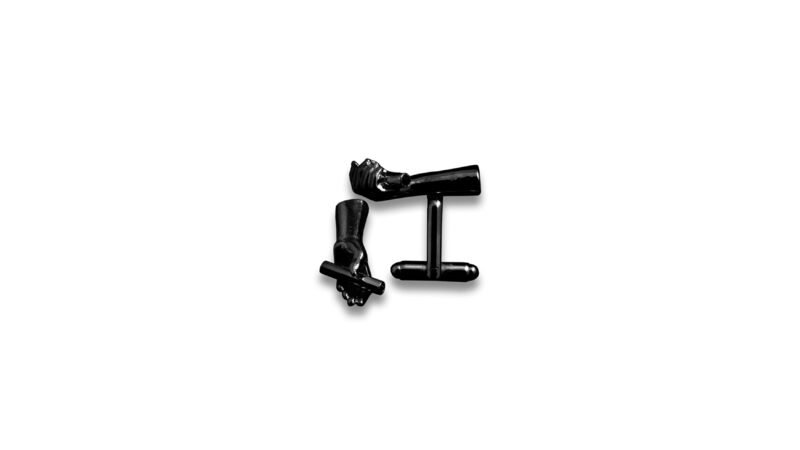 Black varnish finish of Milius Act II Piece 02 “Conduit I”, conceptual cufflinks reduced to silhouette, emphasizing alignment, negative space, and controlled directional flow.