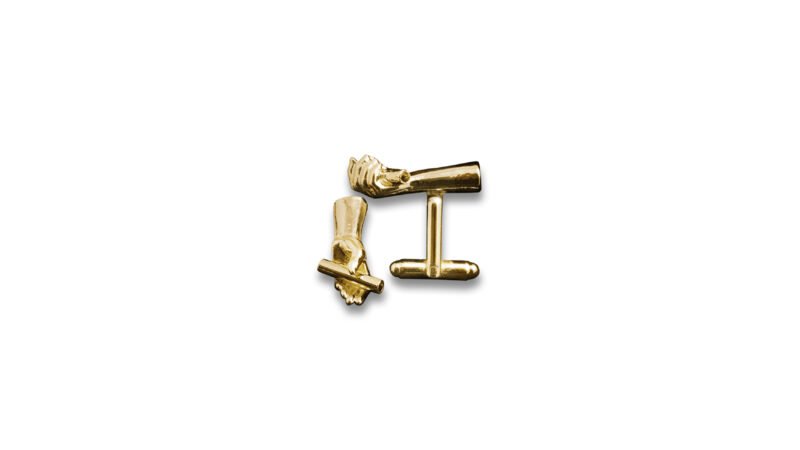 Gold plated finish of Milius Act II Piece 02 “Conduit I”, conceptual cufflinks emphasizing directional flow and transmission through reflective sculptural metal surfaces.