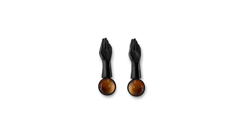 Black varnish finish of Milius Act II Piece 06 “Terminal Gesture,” conceptual earrings emphasising absorption, finality, and structural closure.