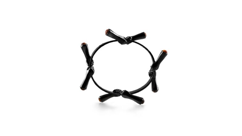 Black varnish sculptural bracelet from MILIUS Act III Consequence Piece 05 by Milan Stamenovic