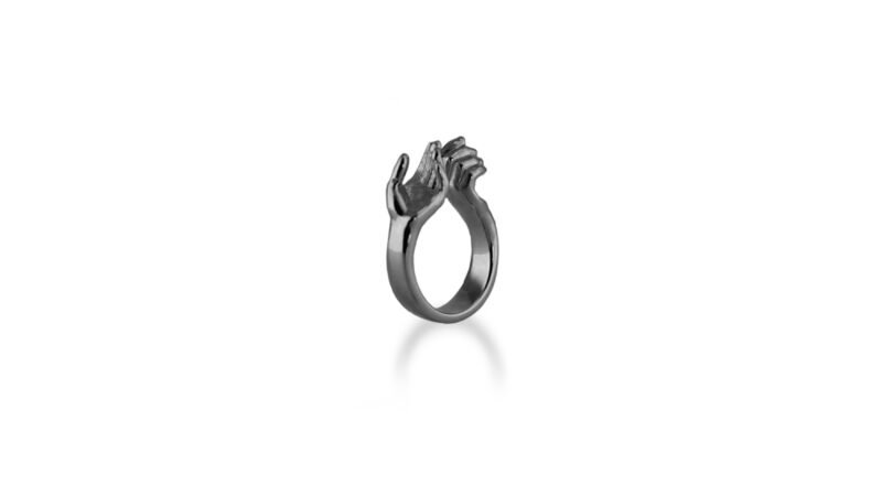 Ruthenium plated version of Milius Act III Piece 01 “Bearing Hands,” dark sculptural ring emphasising weight, permanence, and embodied consequence.