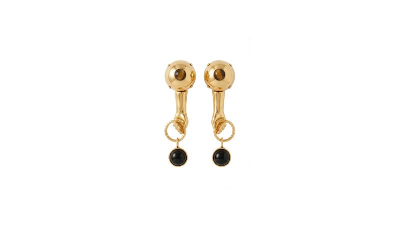 MILIUS PAIR earrings in gold galvanised finish with black semi-precious stone, sculptural jewellery documentation.