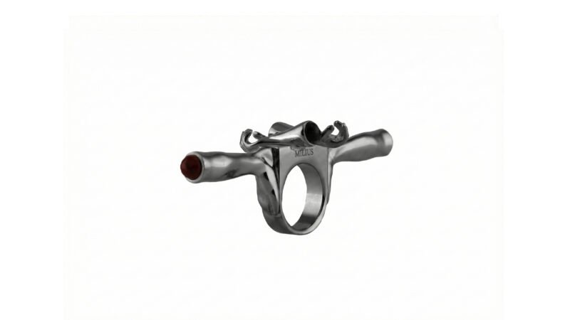 MILIUS Concentration ring in ruthenium finish with red semi-precious stone, artist-designed jewellery.