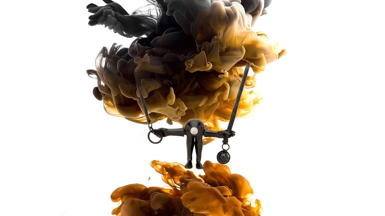 Master image of FIGURE necklace from Milius for Luisa Via Roma suspended within flowing black and amber ink.