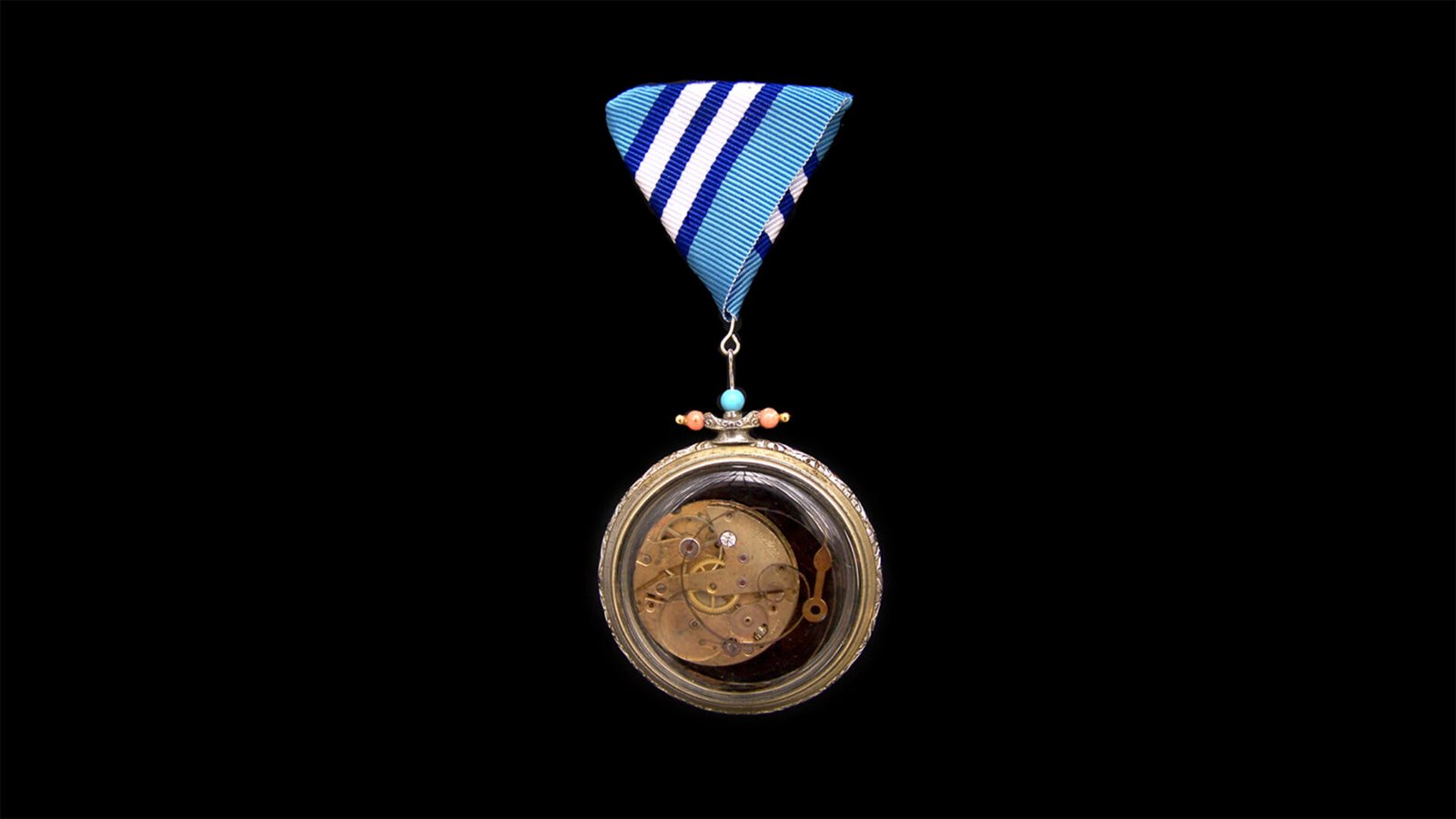 Mechanical inscription pin / medal made by hand in Florence, Italy.