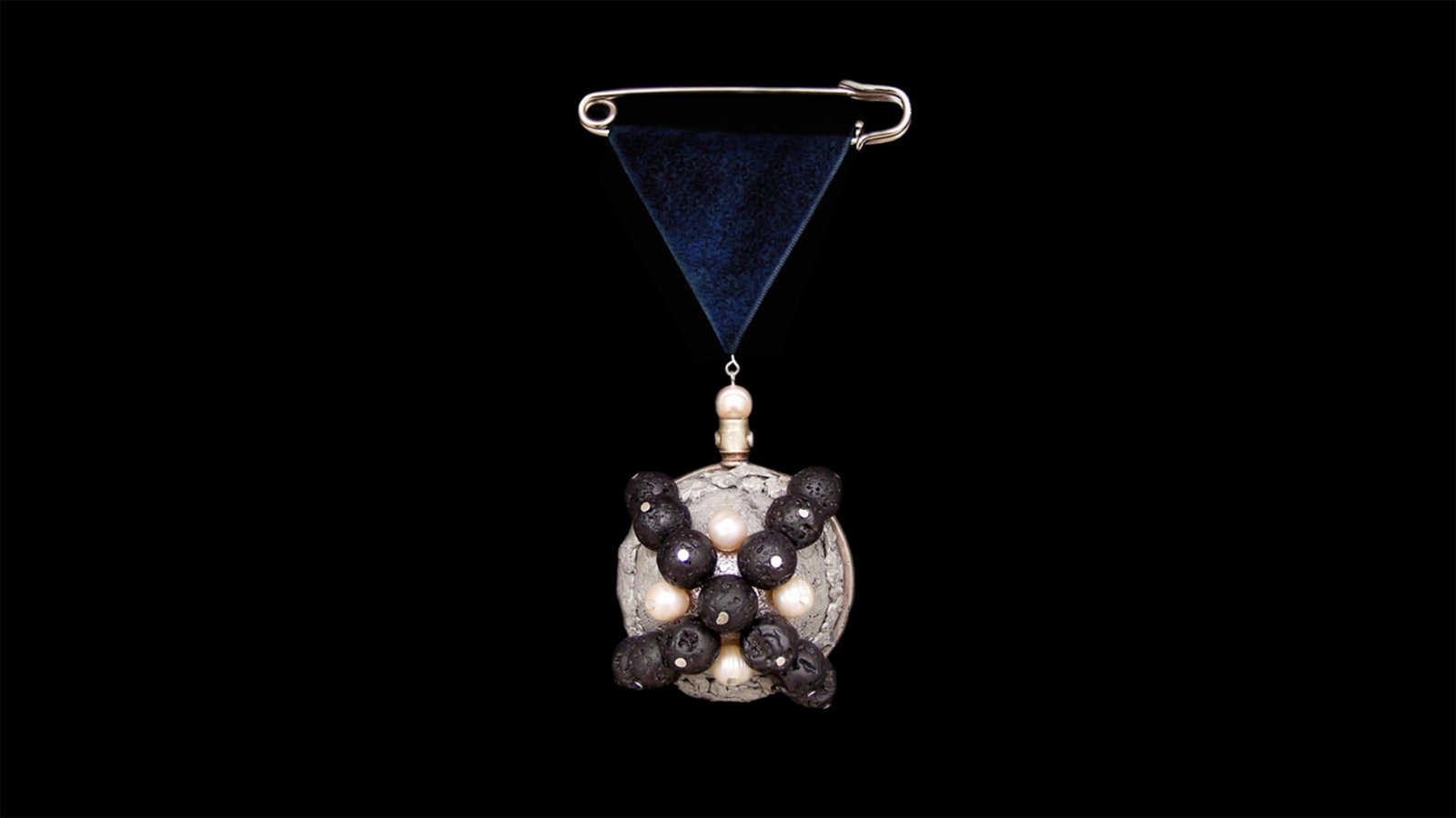 Wearable symbol pin from Time Collection