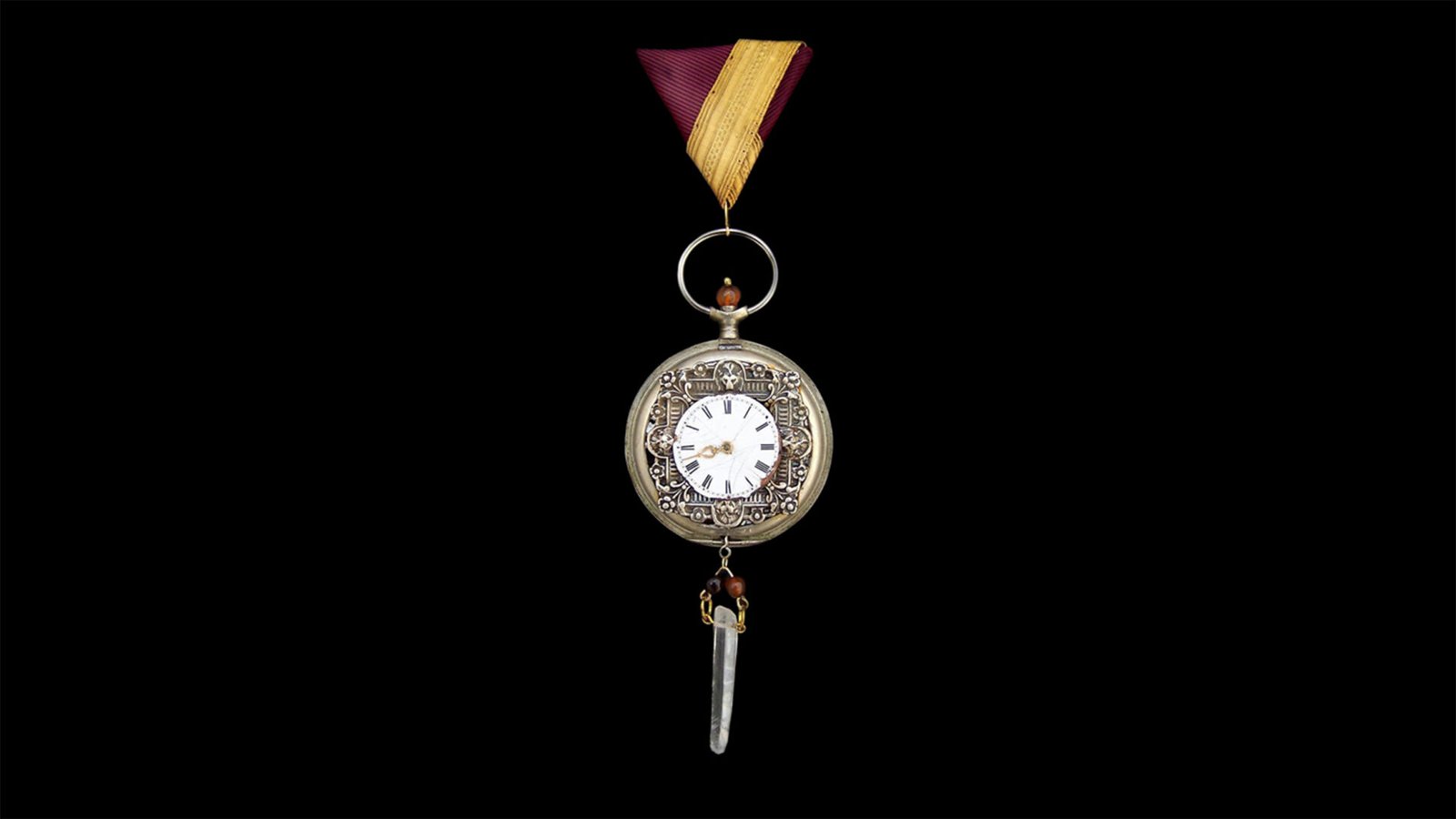 Time Collection Series I jewelry piece 4 isolated on black background, circular wearable time object