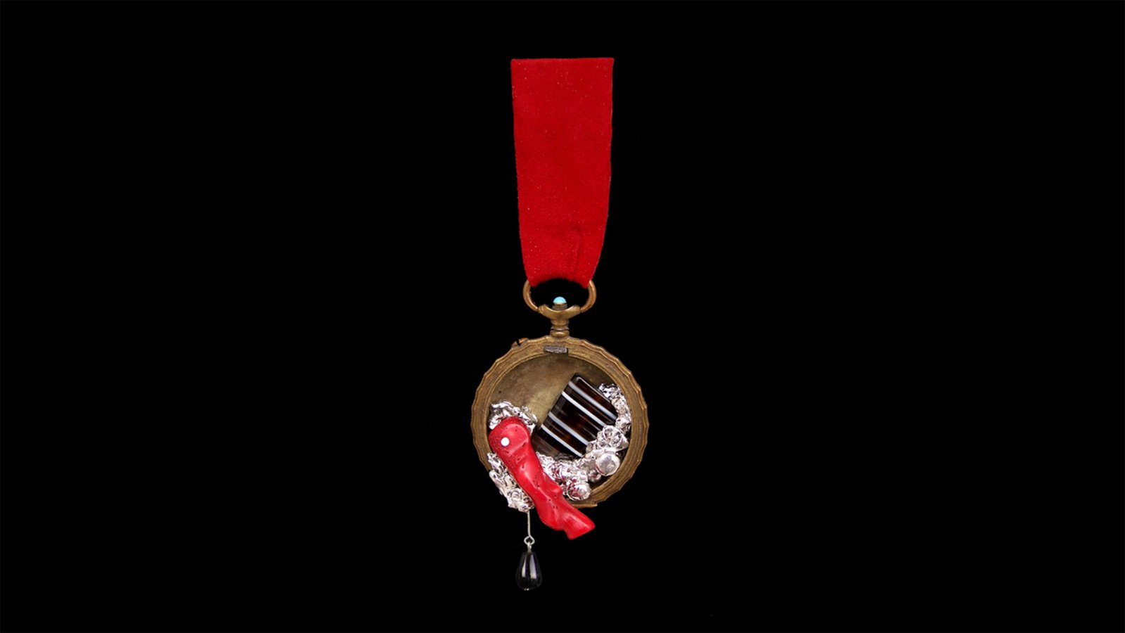 Worn mechanism pin with handcrafted details