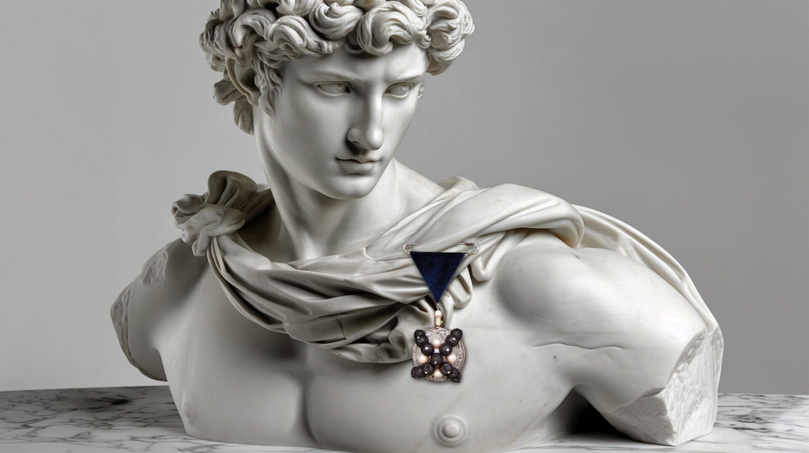 Time Collection Series IV jewelry piece 2 worn on marble sculpture, contemporary time-based wearable art