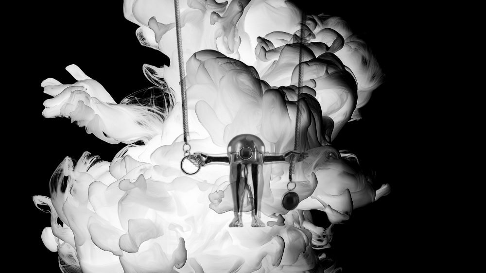 Secondary master image of the Milius piece “Figure,” created for the Luisa Via Roma exclusive Concentration chapter, depicting a suspended anthropomorphic form held between opposing forces, where structure emerges through isolation and balance.