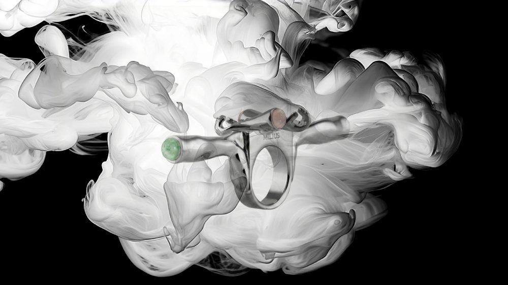 Secondary master image of the Milius piece “Concentration,” created for the exclusive Luisa Via Roma chapter, showing a sculptural ring form suspended within soft, ink-like vapor against a black background, emphasising reduction, focus, and controlled tension.